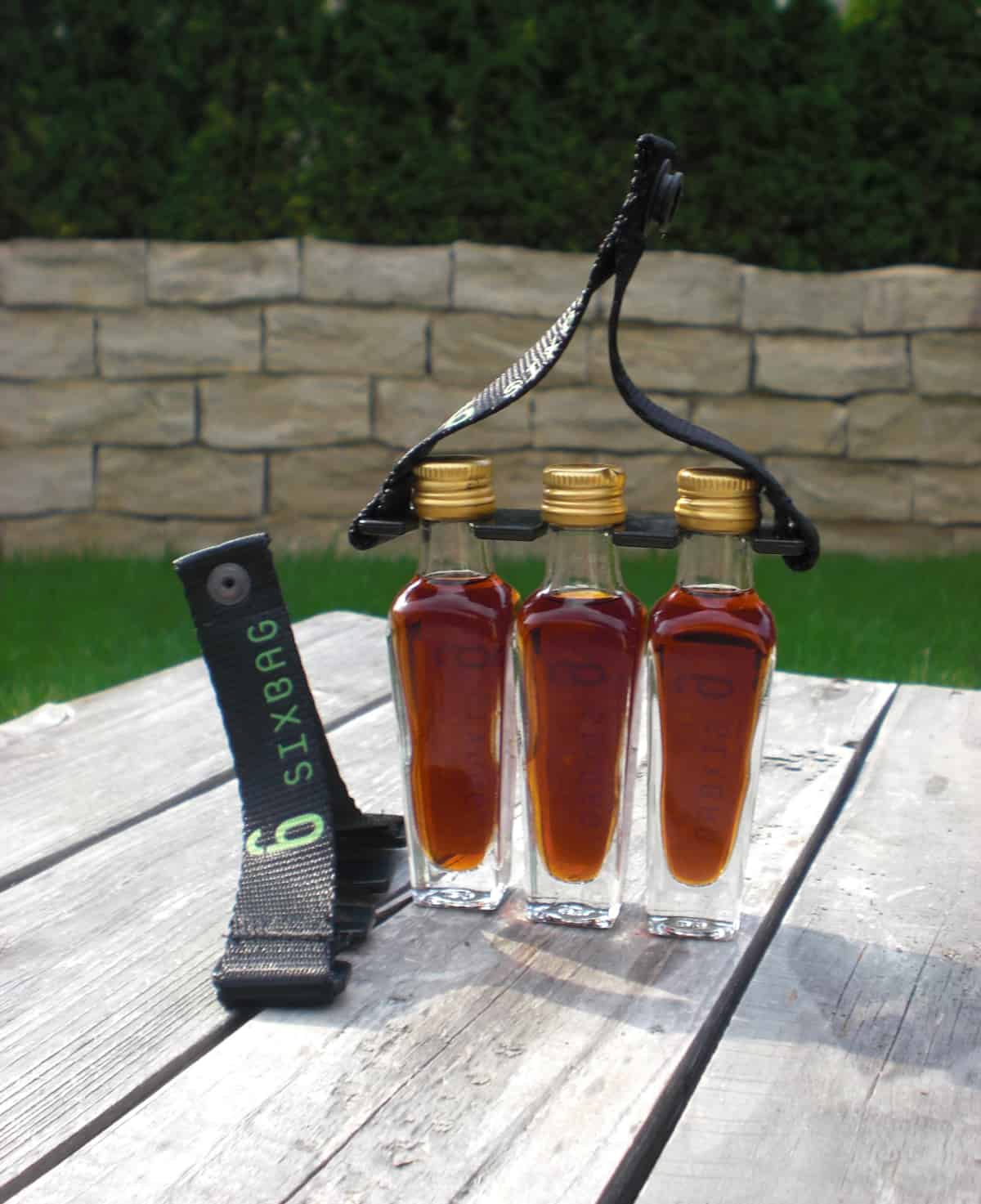 Getränkehalter für Schnapsflaschen (Schnapsgürtel)  SIXBAG - der mobile  Getränkehalter mit Klickadapter
